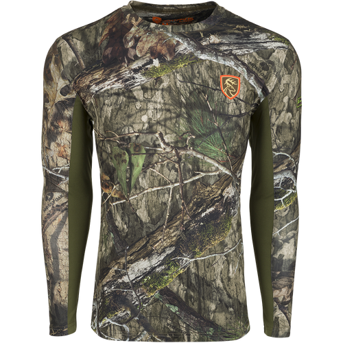 Performance Crew L/S with Agion Active XL: A long-sleeved shirt with camouflage pattern and deer logo. Ideal for early season hot weather walks and tree stand concealment. Moisture-wicking, quick-drying, and fade-resistant.