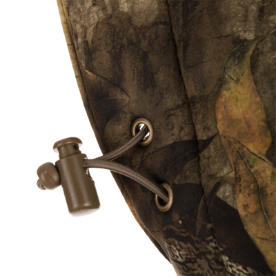 Close-up of the Stand Hunter's Silencer Jacket with Scent Control, highlighting the durable zipper and soft, quiet outer fabric designed for late-season hunting.