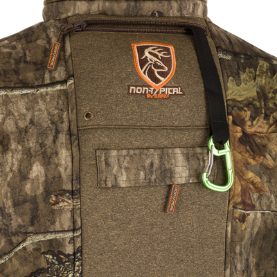Stand Hunter's Silencer Jacket with Scent Control, featuring multiple pockets, a carabiner clip, fleece lining, and a durable, quiet fabric for effective late-season hunting.
