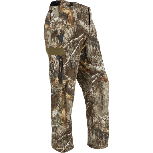 A pair of lightweight EST Camo Tech Stretch Pants made from 100% polyester. Features adjustable waistband, multiple pockets, and elastic ankle cinch cord. Perfect for hunting and outdoor activities.