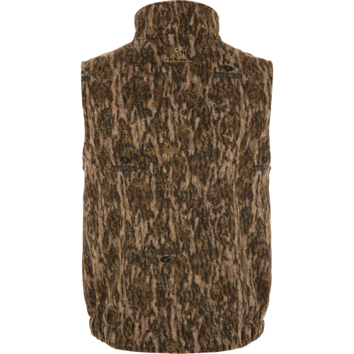 Non-Typical Windproof Layering Vest, showcasing a camouflage pattern, stand collar, elastic hem, and logo, designed for warmth and functionality with multiple zippered pockets.