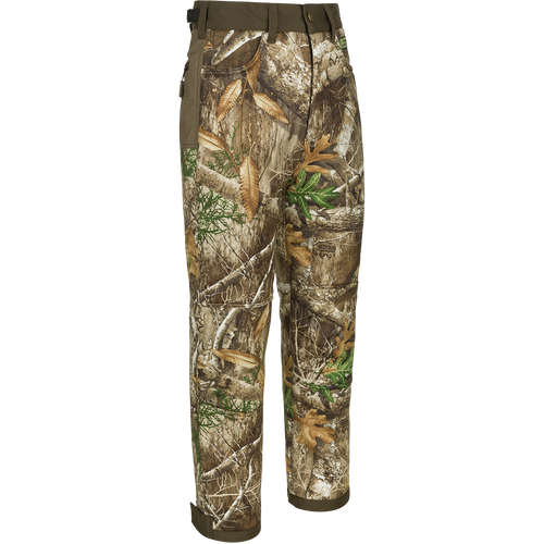 A pair of Standstill Windproof Pants with Agion Active XL®, perfect for late-season hunts. Soft, quiet, and durable, these pants are your weapon against the cold and winds. Features adjustable waist and cuffs, front slash pockets, cargo pockets, and rear pockets. Made with 100% Polyester Microfiber Interlock Standstill Fabric and 400-gram Polyester Fleece Backing. Final Sale. From Drake Waterfowl.