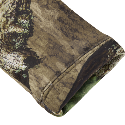 Close-up of the Non-Typical Silencer Hoodie sleeve, showcasing camouflage fabric and premium thermal-regulating material, designed for hunting with Agion Active X2 technology.