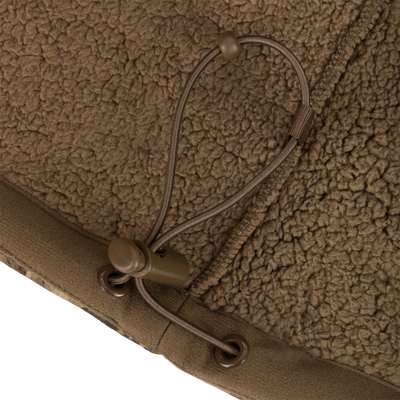 Close-up of brown sherpa-style fleece with nylon draw-cord and toggle, part of the Non-Typical Silencer Hoodie with Agion Active X2 for hunting warmth and stealth.