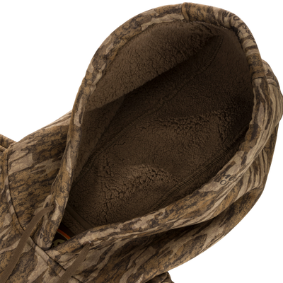 Non-Typical Silencer Hoodie with Agion Active X2, showcasing camo-patterned hood lined with thick brown Sherpa fleece, featuring adjustable drawcords and metal grommets for hunting comfort.