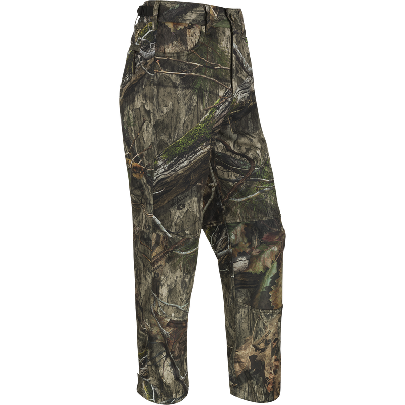 Youth Endurance Camo Pant With Agion Active XL: A mid-weight, fleece-lined pant with adjustable waist, front and rear pockets, and ankle stirrups for hunting.