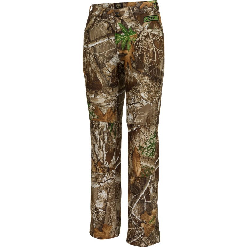 Women's Endurance Jean Cut Pant with Agion Active XL, a pair of camouflage pants for mid-season hunting. Features front and rear pockets, adjustable waist, and odor control technology.
