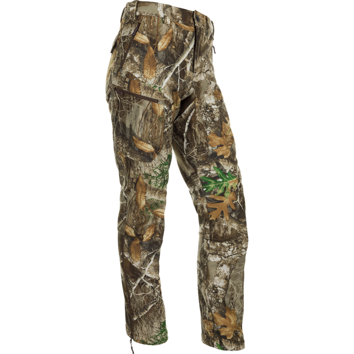 MST Microfleece Softshell Pant - Realtree: Camouflage pants with leaf accents, wind-resistant fabric, 4-way stretch, and moisture-repellent lining. Scent control technology, comfortable fit, articulated knees, and easy movement with side zips.