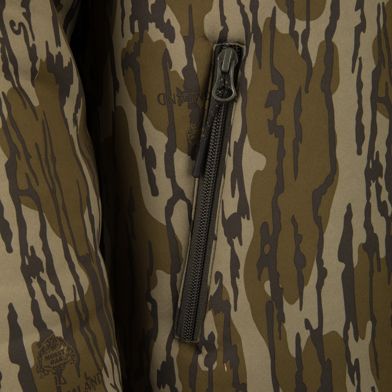 Non-Typical Silencer Full Zip Hoodie featuring a camo print with Midland logo and Mossy Oak emblem, showcasing a vertical zip pocket for hunting.