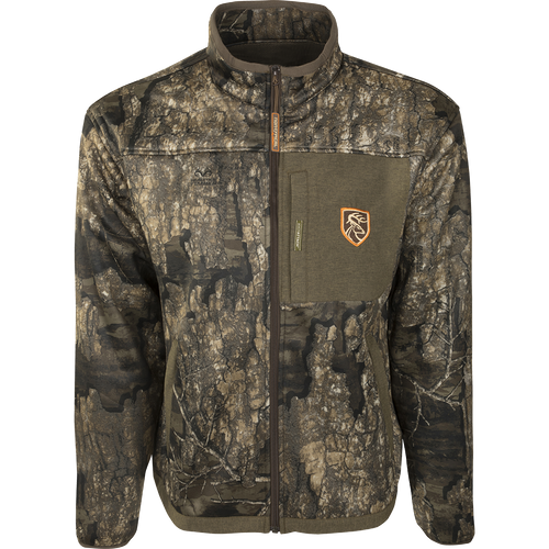 A lightweight camouflage jacket with a quarter-zip neck and magnetic chest pocket, ideal for cool fall days. Made of polyester microfiber interlock fabric with Agion Active XL® odor control technology. Perfect for hunters seeking an advantage over game animals.