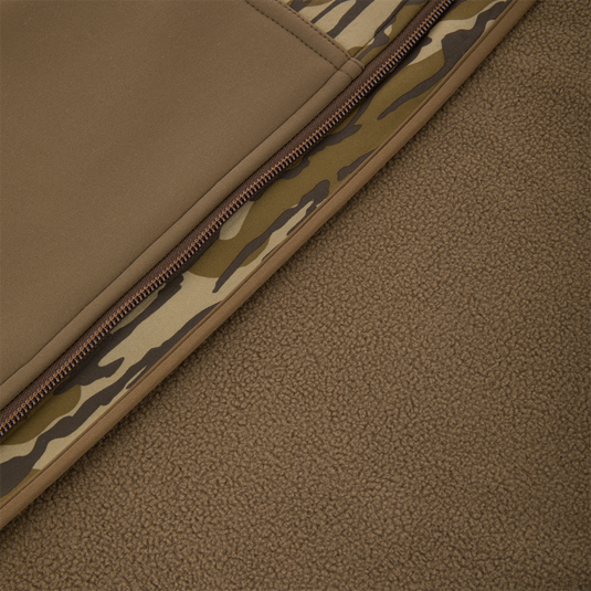 Non-Typical Endurance Hooded Full Zip Jacket with Scent Control, featuring a camouflage-print trim zipper and fleece lower section, designed for hunting comfort and protection.