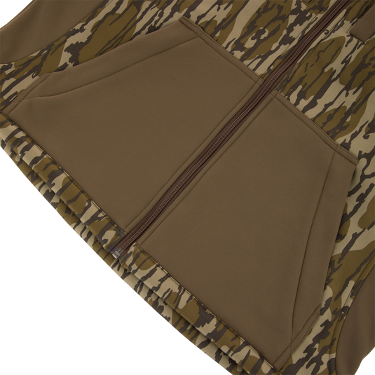 Non-Typical Endurance Hooded Full Zip Jacket with Scent Control, featuring olive-green kangaroo pocket and camouflage sides, designed for mid-season hunting comfort and protection.