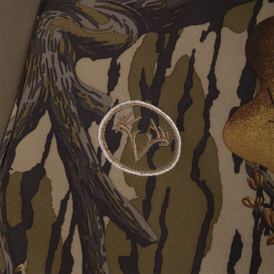 Close-up of a Non-Typical Endurance Hooded Full Zip Jacket with Scent Control in camouflage, featuring an adjustable hood and an embroidered deer antler logo within a circular border.