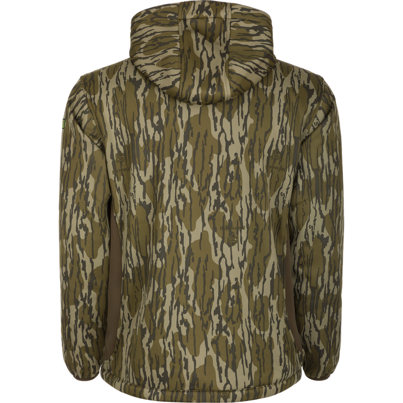 Back view of the Youth Endurance Full Zip Jacket with Hood in woodland camouflage, featuring elasticized cuffs, rounded hem, and adjustable hood, designed for outdoor activities.