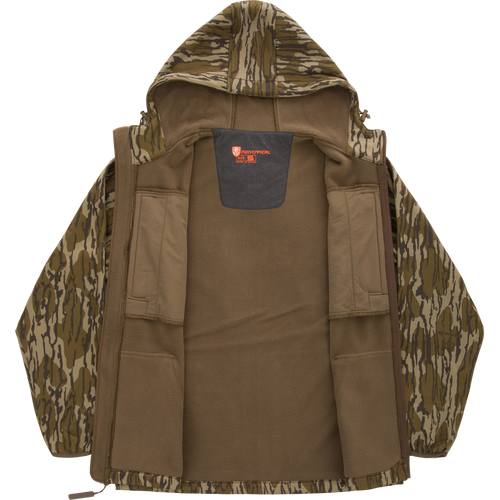 Youth Endurance Full Zip Jacket with Hood, camo-patterned, unzipped to show olive fleece lining, internal chest pockets, and a branding tag, designed for warmth and scent control.