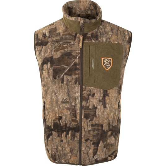 A Windproof Layering Vest with a patch, camouflage design, and deer logo. Features pockets and Agion Active XL® scent control technology.