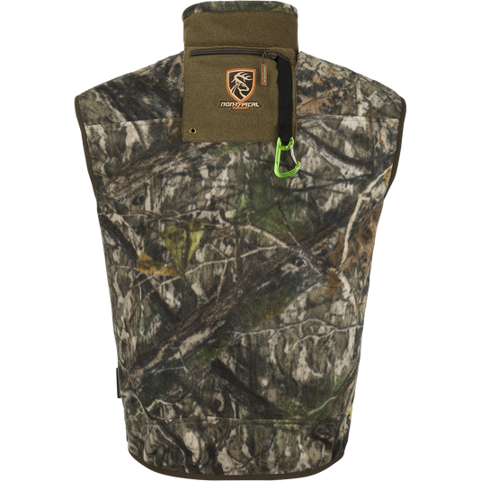 A windproof layering vest with a zipper, featuring camouflage design and a deer logo. Ideal for keeping your core warm and arms mobile during outdoor activities. From Drake Waterfowl, a store known for high-quality hunting gear and clothing.