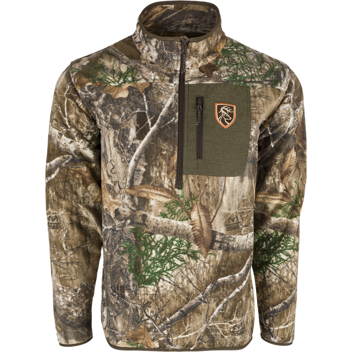 A camouflage jacket with a zipper, perfect for big game hunters. Made of plush 200 gram fleece for warmth and moisture-wicking insulation. Final Sale.