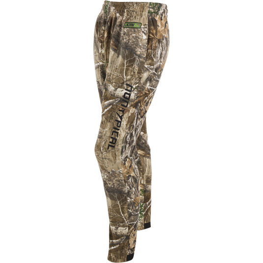 A close-up of the Storm Front Fleece Midweight 4-Way Stretch Pant, a pair of camouflage pants for big game hunters.