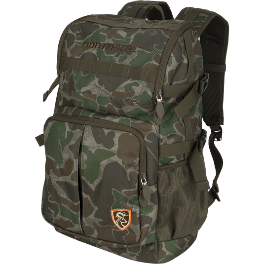 A Non-Typical Rucksack, perfect for hunting, with versatile pockets, MOLLE loops, adjustable straps, and foam padding. 12"x8.25"x20", 2.57 lbs.