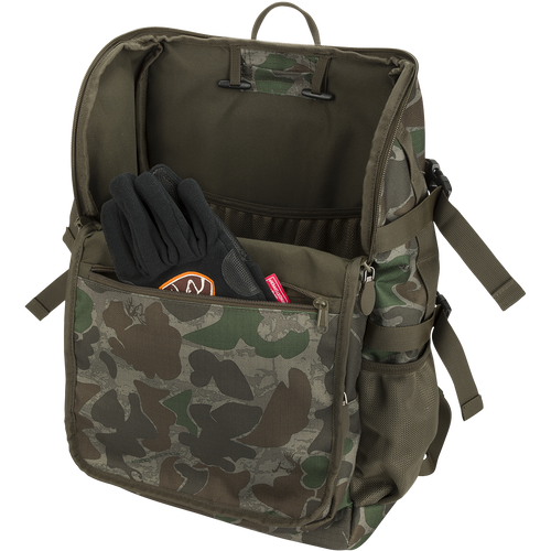 Non-Typical Rucksack: A backpack with gloves inside, perfect for hunting. Versatile pockets, MOLLE loops, adjustable straps, and foam padding for comfort. Dimensions: 12