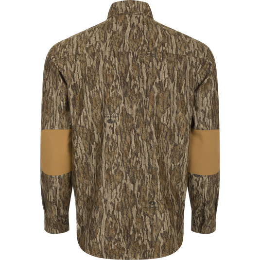MST Microfleece Softshell Shirt - Realtree: A camouflage shirt with a back view, fabric close-ups, and logo detail. Features wind-resistant softshell fabric, microfleece lining, scent control technology, 4-way stretch, and convenient pockets. Ideal for hunting and outdoor activities.