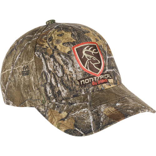 Non-Typical Logo Camo Cotton Cap - Realtree: A camouflage hat with the Non-Typical logo on the front. Made of 100% cotton twill fabric, it features a hook & loop closure. Stay concealed and comfortable.