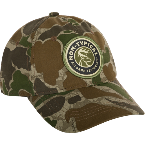 A close-up of the Big Game Technology Patch Camo Twill Cap, featuring a camouflage hat with a logo patch.