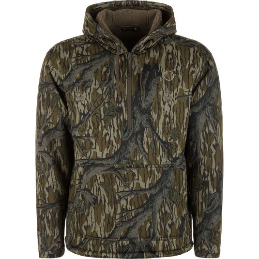 The Non-Typical Slacker Quarter Zip Hoodie by Nontypical in Mossy Oak Original Treestand features a front quarter zip, kangaroo pocket, and leafy branch design, shown on a plain white background.