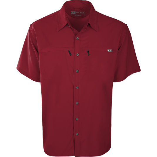 Town Lake Shirt S/S: Lightweight, moisture-wicking shirt with UPF 30 sun protection. Features vented cape back, mechanical stretch fabric, and 2 zipper pockets. Ideal for warm months and versatile for any occasion.