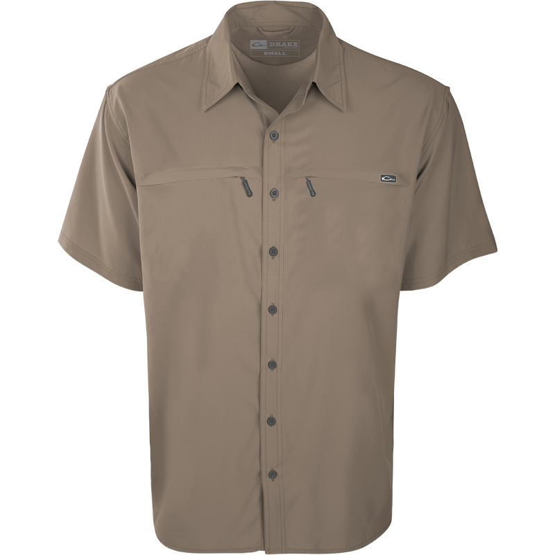 A lightweight, stretchy short-sleeved shirt with a textured fabric. Made from 100% polyester, it offers UPF 30 sun protection and moisture-wicking technology. Perfect for warm months and versatile for any occasion.