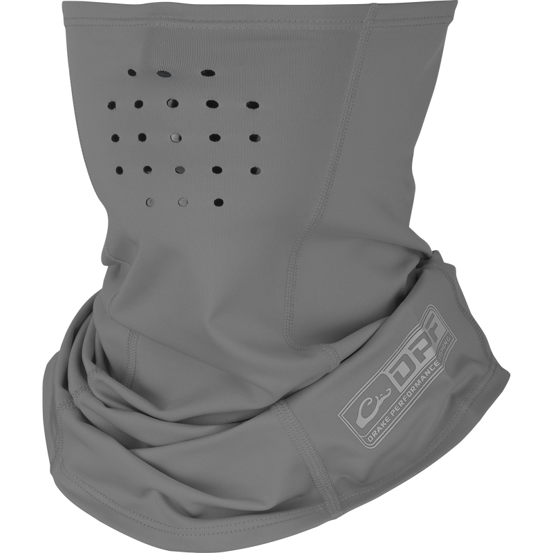A grey neck gaiter with holes, providing optimal protection and comfort for outdoor activities.