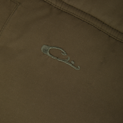Close-up of Delta Featherless Down Vest seam with matching embroidery, showcasing durable craftsmanship and quality materials for outdoor performance in changing conditions.