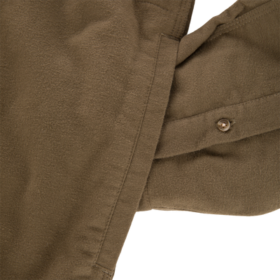 Close-up of the Delta Moleskin Shirt Jacket, highlighting its soft suede texture, top-stitching, and a button, showcasing durable, outdoor-ready design features.