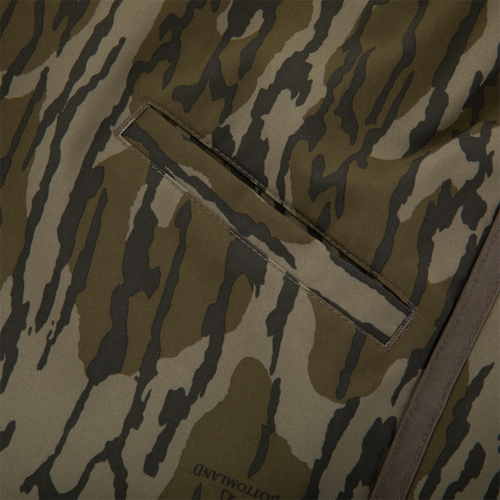 Close-up of Lake Shore Shorty Short's camouflage fabric panel, featuring a horizontal welt pocket, showcasing its durable design ideal for water-related activities.