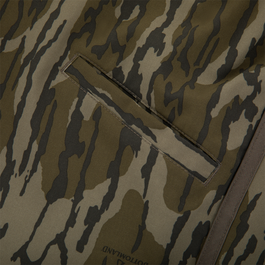 Close-up of Lake Shore Shorty Short's camouflage fabric panel, featuring a horizontal welt pocket, showcasing its durable design ideal for water-related activities.