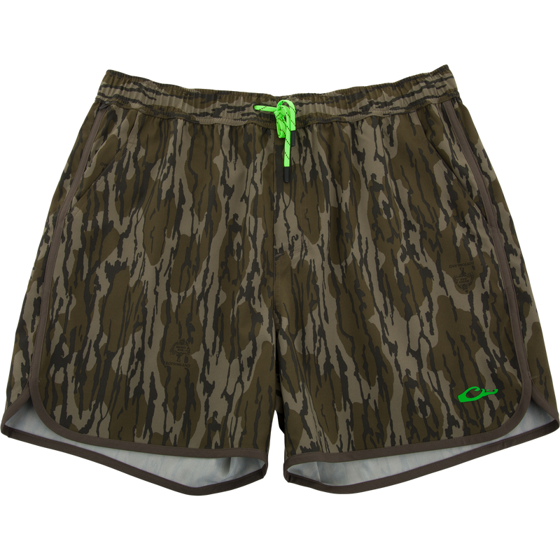 Lake Shore Shorty Short with elastic waistband, neon-green drawstring, side pockets, curved hem; ideal for water activities with DWR finish and mobility-enhancing design.