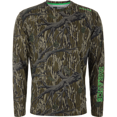 Lake Shore Performance Long Sleeve Crew in woodland camo, featuring DRAKE branding and Mossy Oak logos, designed for cooling, sun protection, and moisture-wicking comfort.