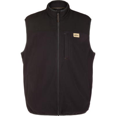 Camp Fleece Vest in black fleece with a zip-up design, featuring a stand-up collar, Magnattach™ chest pocket, and water-resistant shoulder overlay for outdoor durability.