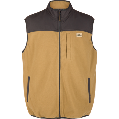 Camp Fleece Vest with dark-brown yoke, stand-up collar, and zip closure; features Magnattach™ chest pocket and soft-lined waist pockets for warmth and utility.
