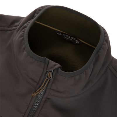Close-up of Drake Camp Fleece Vest's fleece-lined collar, coil-style zipper with paracord pull, showcasing comfort and durability for versatile outdoor use.