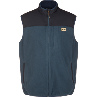 Camp Fleece Vest on mannequin, featuring steel-blue fleece, dark navy shoulder overlay, zip-up front, Magnattach™ chest pocket, and water-resistant finish for outdoor durability.