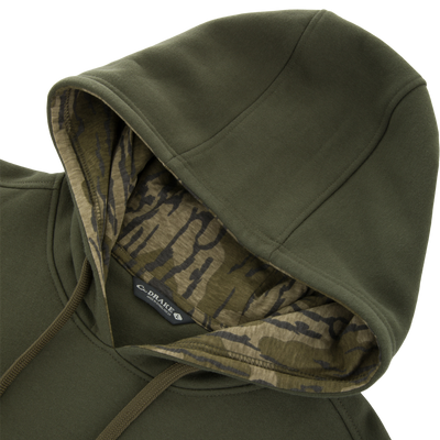 Olive-green Three End Classic Hoodie close-up, showcasing camouflage-lined hood with drawcord, emphasizing durable fabric and kangaroo pocket, ideal for versatile outdoor wear.