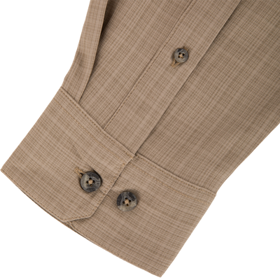 Close-up of Wingshooter Cross Hatch Shirt's khaki-beige cuff, showcasing textured fabric, stitching, and button details, highlighting its lightweight, breathable, and functional design.