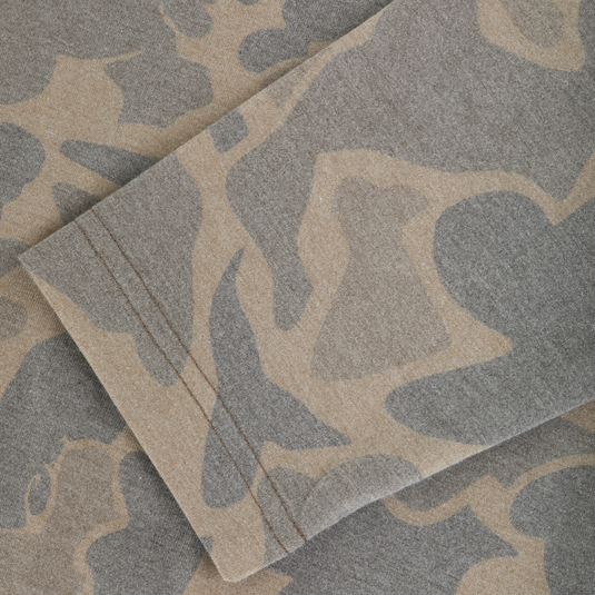 Close-up of a Tri-Blend Henley Over Under in a lightweight, long-sleeved gray and tan camouflage pattern.
