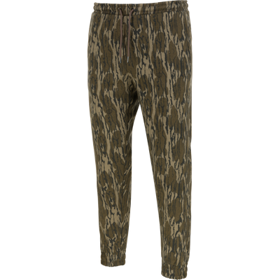 Lifestyle Three End Cargo Sweat Pant in Mossy Oak Original Bottomland camouflage, featuring midweight fabric with stretch technology, an elastic drawstring waist, and cuffed hems.