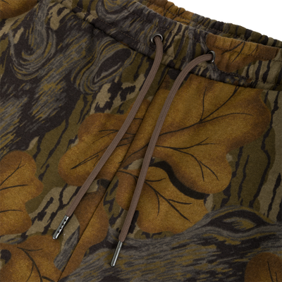 Close-up of Three End Cargo Sweat Pant in a midweight camouflage print with an elastic waistband and brown drawstring cords.
