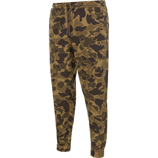Lifestyle Three End Cargo Sweat Pant in a brown and green camouflage pattern, featuring an elastic drawstring waistband and ribbed cuffs.