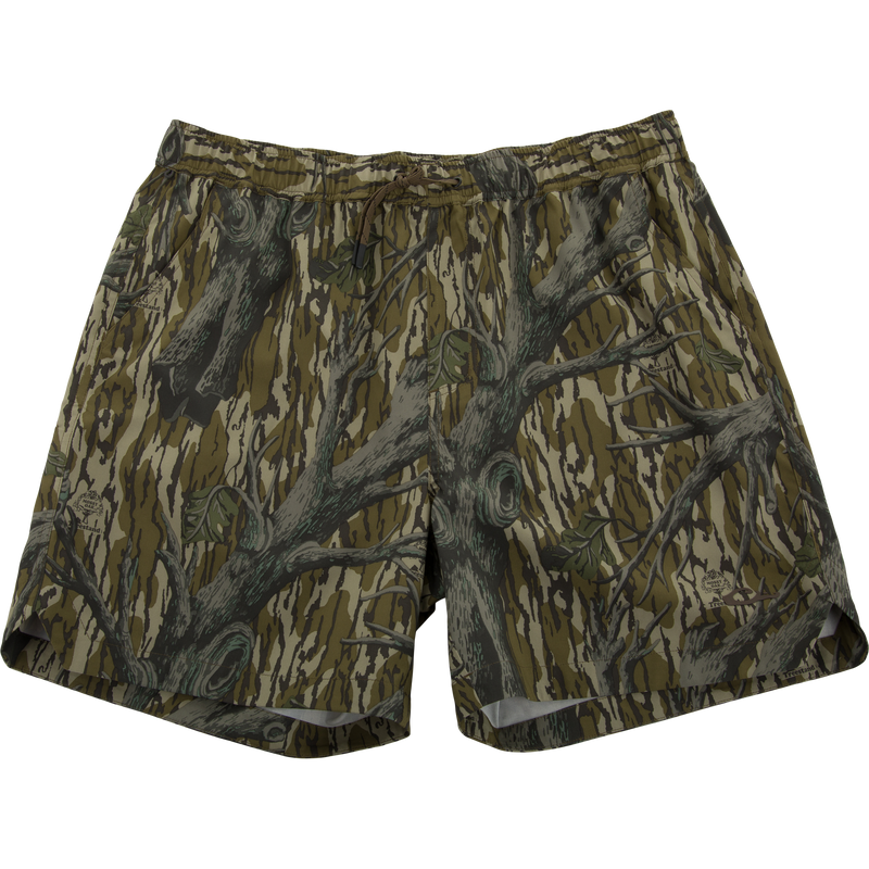 Lake Shore Dock Short features a woodland-camo pattern, elastic waistband with drawstring, and side pockets, offering lightweight comfort and water-repellent finish for outdoor activities.