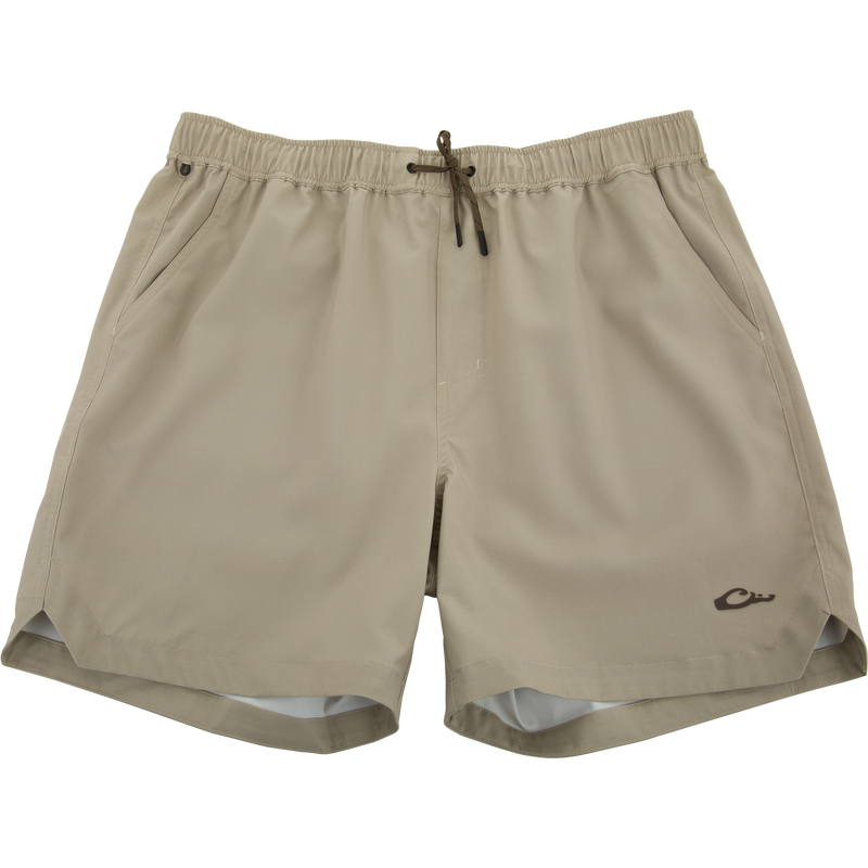 Lake Shore Dock Short with elastic waistband, drawstring, angled pockets, and a small logo, designed for comfort and movement with water-repellent fabric.